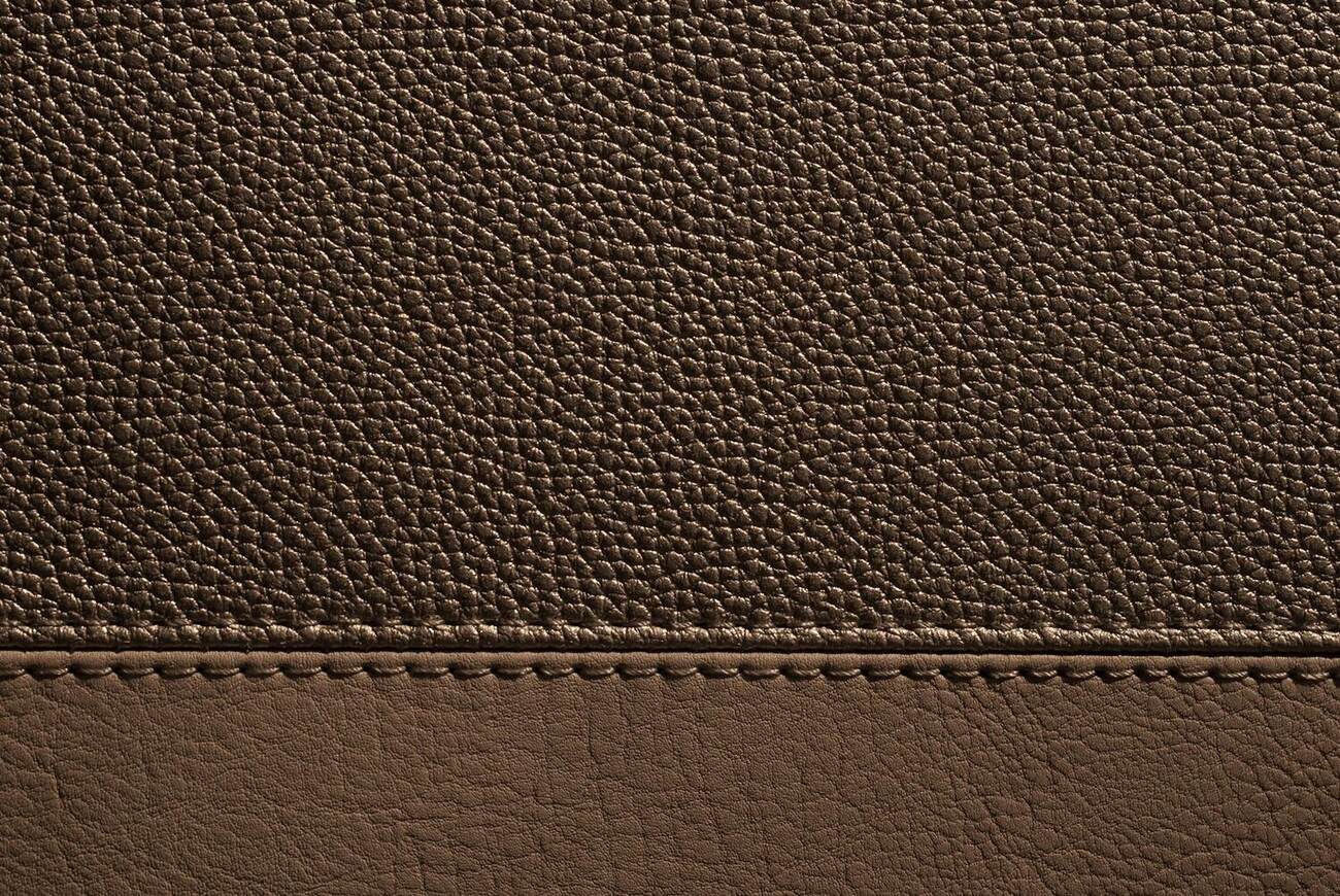 Close-up of leather with careful hand-stitching detail